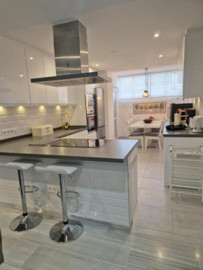 Luxurious Three Bedroom Duplex Apt Close to Beach